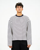 Dorian striped long-sleeve T-shirt in white with navy stripes and a navy collar, front view on a male model.