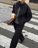 Dorian funnel neck jacket in black, cropped structured jacket with standing collar and button front, styled on model