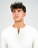 Dorian off-white ribbed long-sleeve Henley shirt, neckline and button-placket detail on a male model.