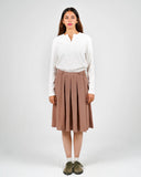 Dorian off-white ribbed long-sleeve Henley shirt, full outfit on a female model.