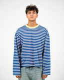 Dorian striped long-sleeve T-shirt in blue and white stripes with a butter-yellow collar, front view on a male model.