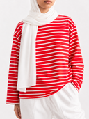Dorian striped long sleeve t-shirt in red and white with a white ringer collar, heavyweight cotton, styled on model